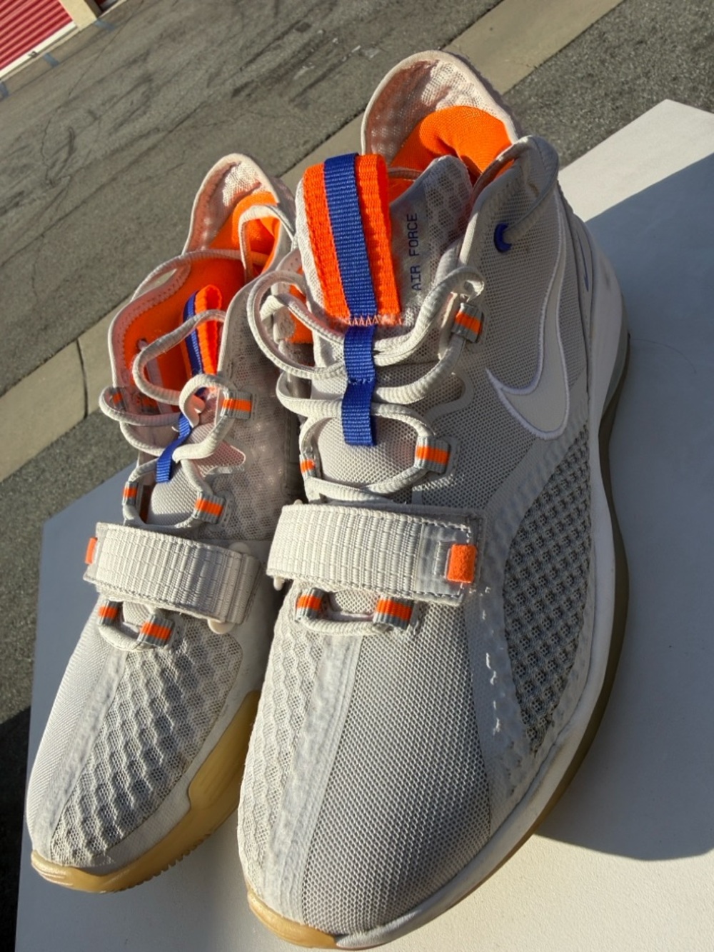 Light Gray Athletic Sneakers with Orange and Blue Accents